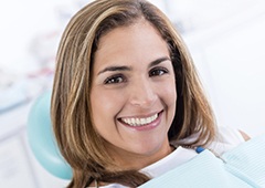 Smiling woman in dental chair