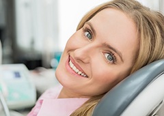 Smiling woman in dental chair